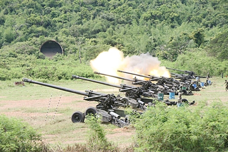 The Thai Navy tests a new weapons-targeting system, firing artillery rounds towards Koh Rin.